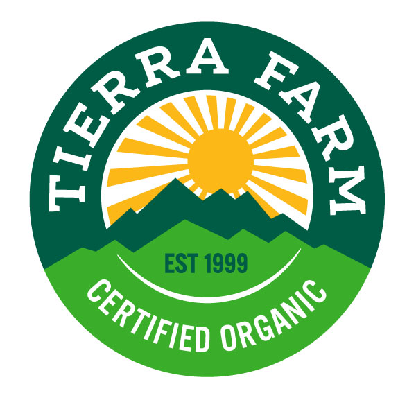 Tierra Farm logo with sun and mountain