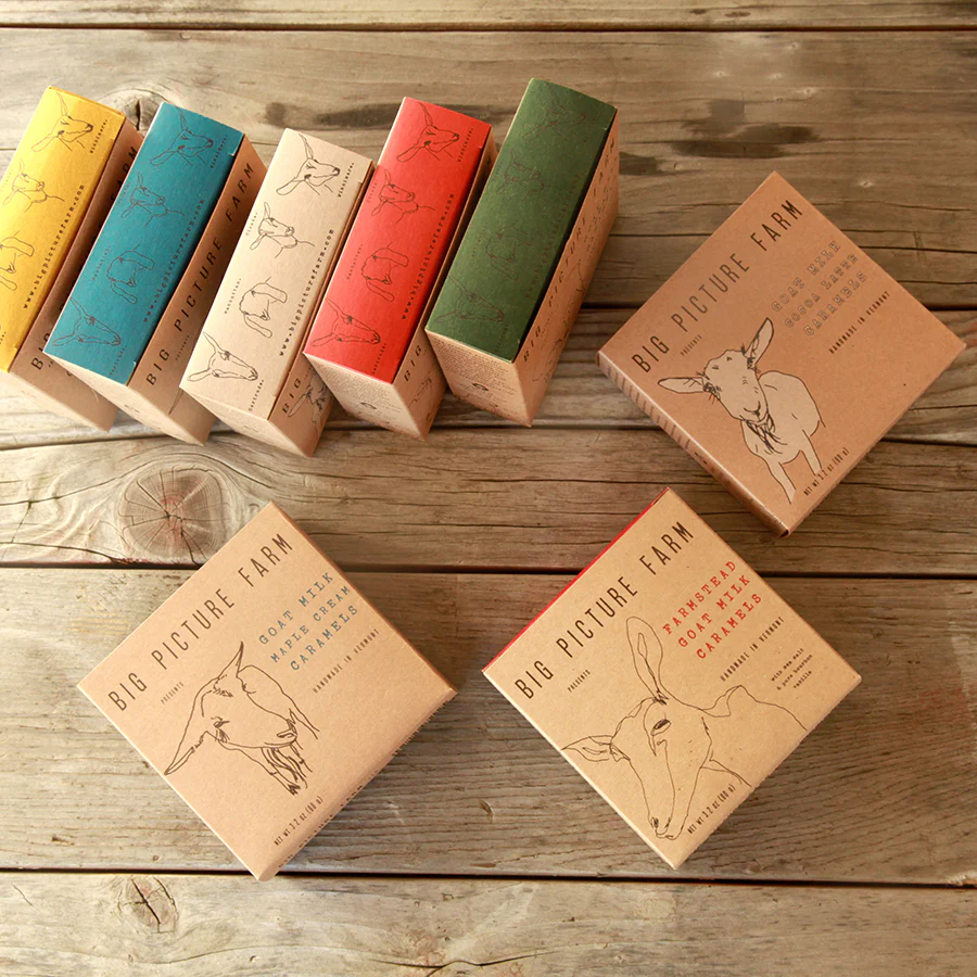 Boxes of caramels on a wooden table